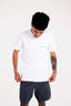 Model looking down on MANON t-shirt.